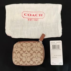 Authentic Coach pill box.